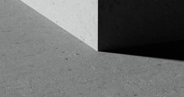 istock An up-close view of a concrete corner bathed in light. 1709631945