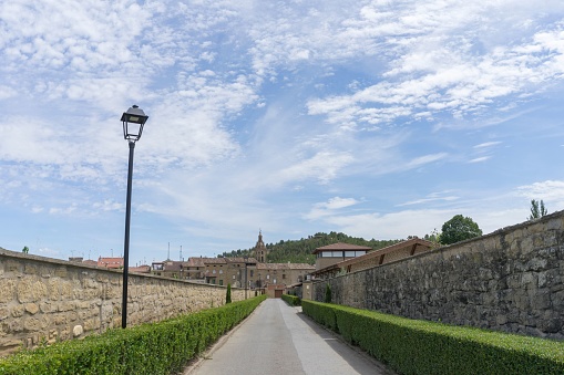 Central road leading to the town center of cuzcurrita del rio tiron, spain