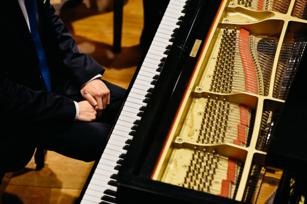 istock Pianist and piano from above. 1709726450