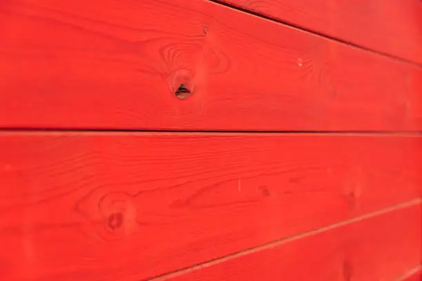 Background of some red wooden boards.