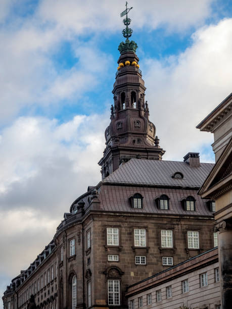 View of the 12th century Christiansborg Palace ornate watch tower Copenhagen, Denmark - Oct 24, 2018: View of the 12th century Christiansborg Palace ornate watch tower. From Christiansborg Slotplads. sentinel spire stock pictures, royalty-free photos & images