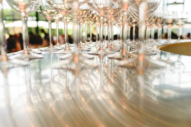 istock Group of empty transparent glasses ready for a party in a bar. 1709770118