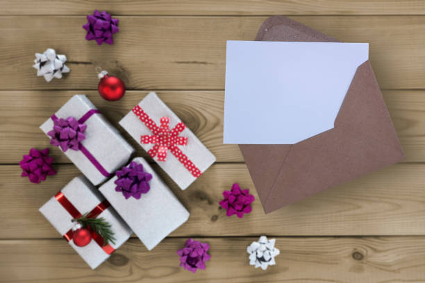 istock Christmas and New Year template for greeting card with gift boxes. 1709800094