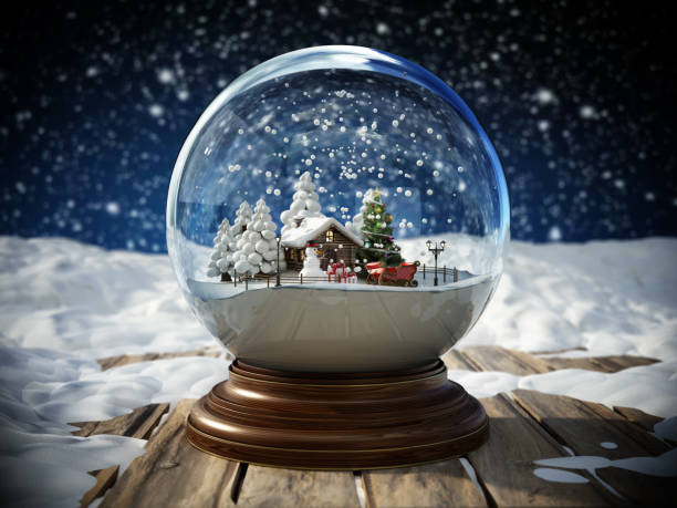 christmas snowglobe and merry christmas text on snow covered old planks on a snowy night background. christmas and new year concept - xmas toys snowflake imagens e fotografias de stock