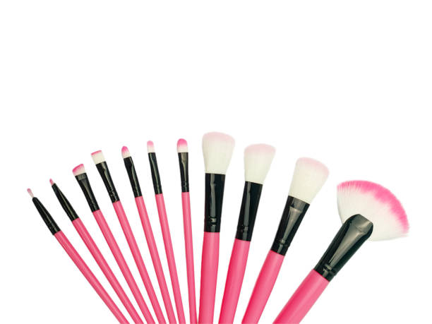 istock Pink makeup brush isolated on a white background 1709812120