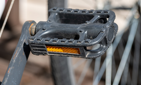 Close up of a black bicycle pedal