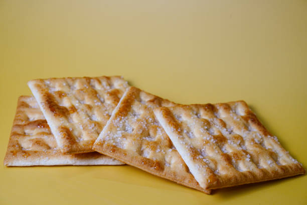 istock close up crackers biscuit on a yellow background 1709814537