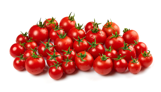 Fresh red tomatoes isolated on white background