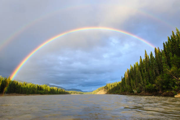 Double rainbow above Stikine river in British Columbia, Canada