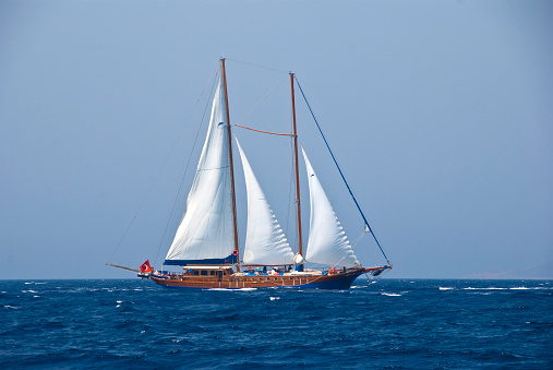 Sailing ship on the sea. Tall Ship.Yachting and Sailing travel. Cruises and holidays. Postcard and Book cover