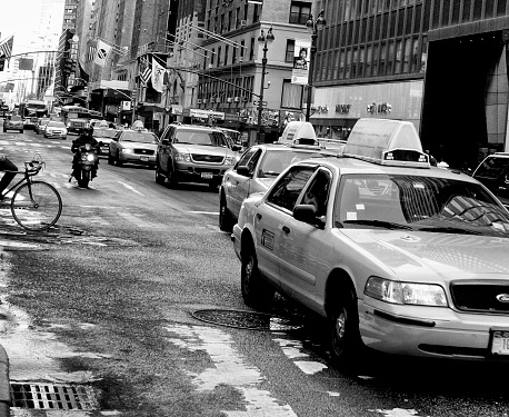 Rush Hour Yellow Cabs Midtown Manhattan NYC. Toned Image.