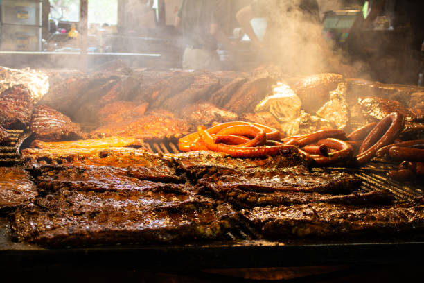istock Hot juicy steaming meat cooks on a large fire oven 1709878127