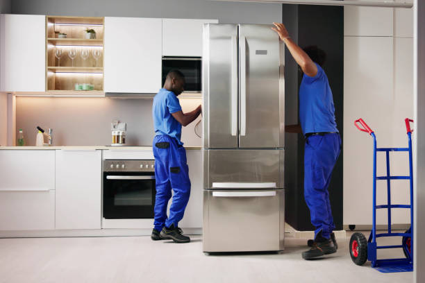 istock Electrician Technician Working To Repair Refrigerator 1709878627