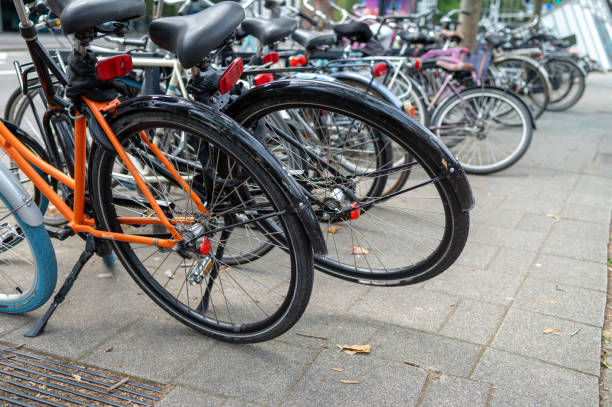 istock Group of bicycles seen parked on sidewalk 1709901353