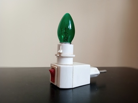 White Color Plug in Night Light Module, Includes Green Clear Steady Light Bulb great for Making Your Own Decorative Night Light.