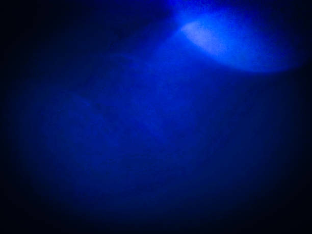 istock Blue illuminated in the dark background 1709919704