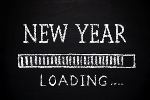 Blackboard with ,, New Year - loading