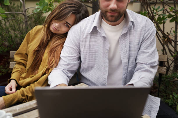 istock Tired Woman Resting Head on Partner's Shoulder in Cafe 1709942917