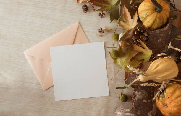 istock Creative autumn composition with pumpkins, fallen leaves and open envelope. Copy space. 1710034719