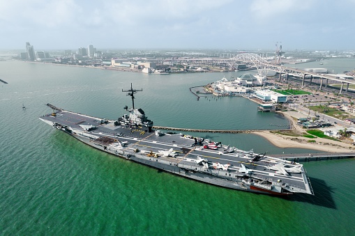 Corpus Christi, United States – May 05, 2023: Aerial view of the USS Lexington Museum on the Corpus Christi Bay, Texas in a bright sunny day