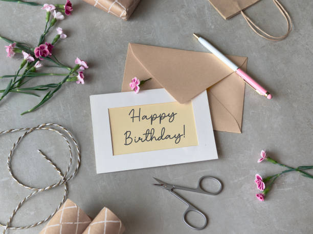 istock Envelope and self made greeting card concept with fresh carnation flowers. 1710078775