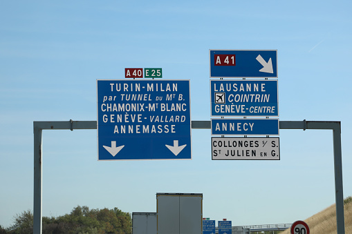 road sign on the border between Italy and France and indications for the tunnel under Mont Blanc