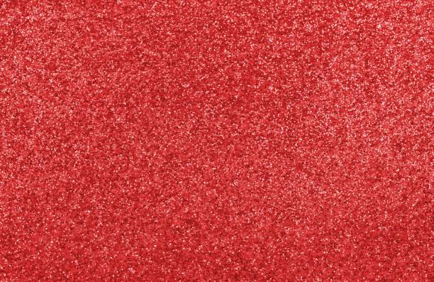 istock RED sparkling glitter BACKGROUND with lights and reflections ideal at CHRISTMAS HOLIDAY 1710173497