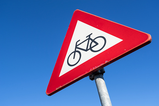 Dutch road sign: cyclists and moped riders