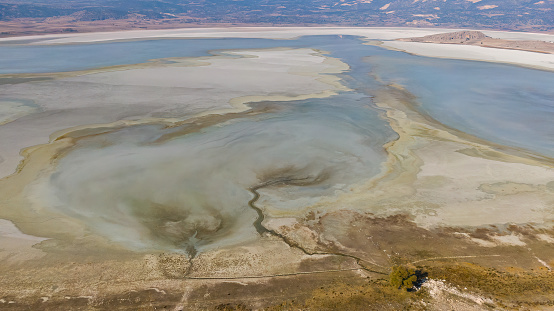 Burdur Yarl Lake, which has started to dry up. The effect of the lake drying up in the summer season of extreme weather and heating wave, Climate change and Drought effect