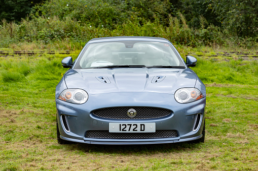 Newcastle-under-Lyme, Staffordshire-united kingdom April, 14, 2023 Jaguar XK Coupe on display at a car show