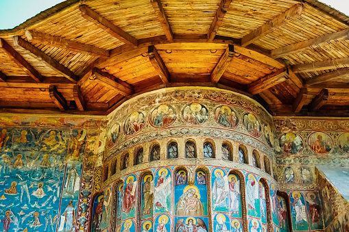 Bucovina, Romania - June 5, 2019: Paintings in frescoes of religious, colorful motifs, in Orthodox Christian monasteries of Bucovina.