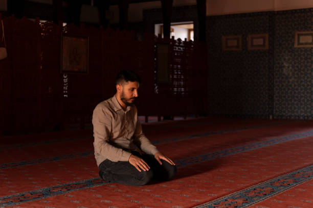 istock Muslim man worshipping in a mosque. 1710406977