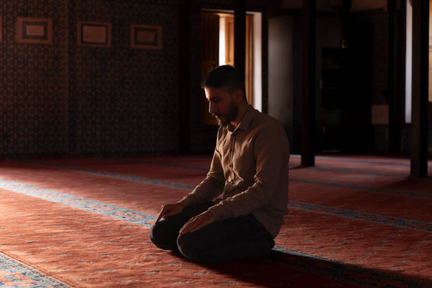 istock Muslim man worshipping in a mosque. 1710406980