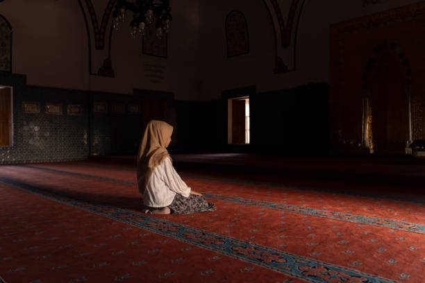 istock Girl child praying in mosque. 1710410741