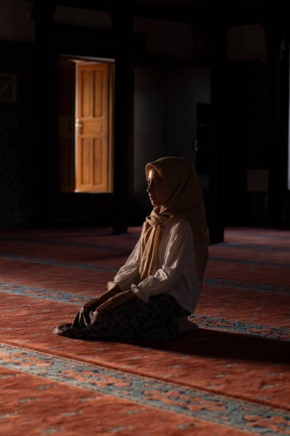 istock Girl child praying in mosque. 1710411775