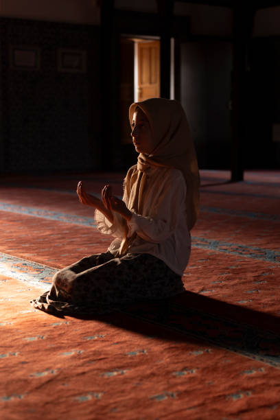 istock Girl child praying in mosque. 1710413887