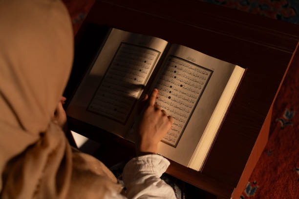 istock A girl reading the Koran in a mosque. 1710417788