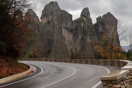 Mountain road to the famous town of Kalabaka (nome of Trikala, Greece) on a rainy, winter, cloudy day