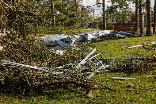 Mail center in ruins after storm: Post office obliterated. Hurricane aftermath in Perry, North Florida