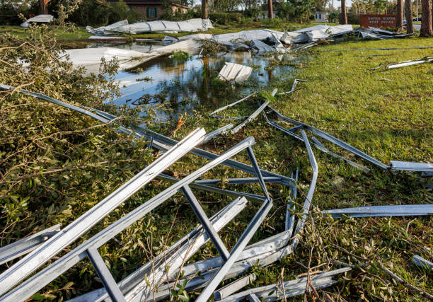 istock Metal constructions debris after hurricane. House devastation in flood after storm in small town. Hurricane aftermath in Perry, North Florida 1710482826