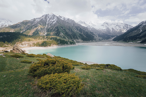 Big Almaty lake. High-mountain lake with turquoise water,