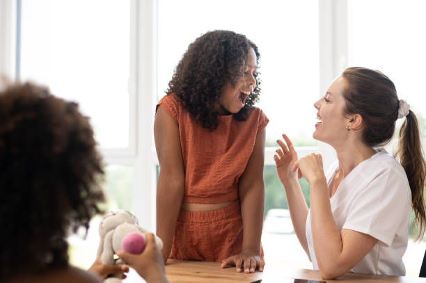 istock A young pediatric dentist with children - patients 1710521911