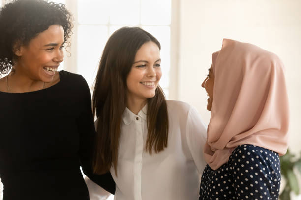 istock Happy multiethnic women laugh and talk together 1710527873
