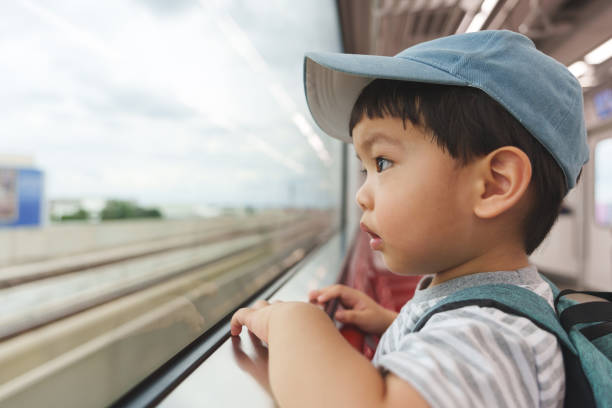 istock Asian Japanese boy in commuter train. 1710609966