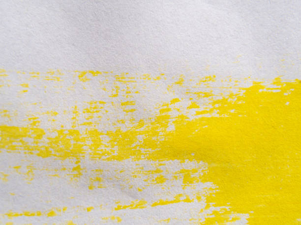 istock Yellow ink splatter background On white paper background. 1710631582