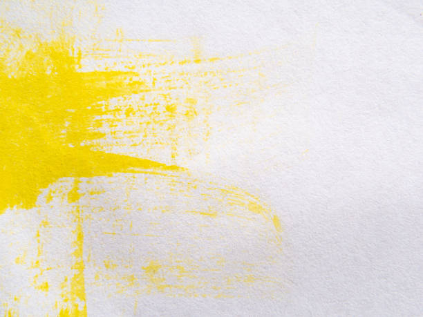 istock Yellow ink splatter background On white paper background. 1710631585
