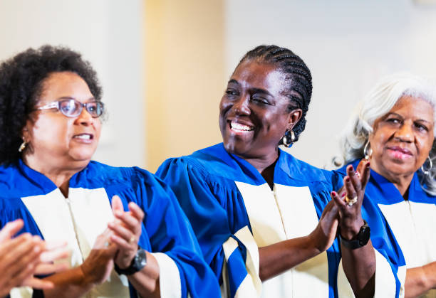 istock Black women singing in church choir 1710639004