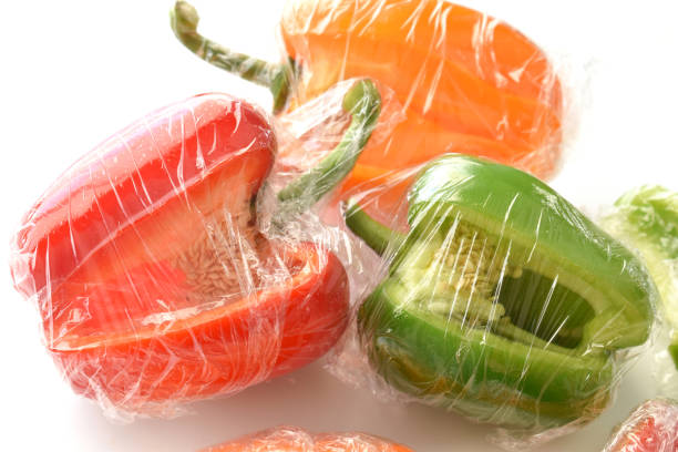 Bell pepper with cling film or plastic food wrap.
