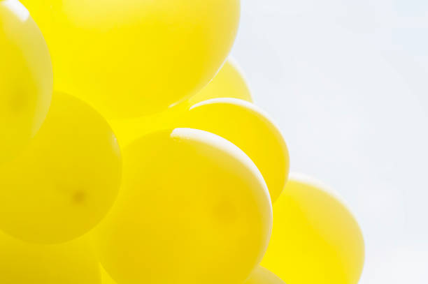 istock Yellow balloon with blue bright sky background 1710745312