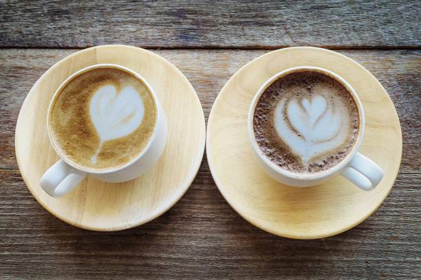 istock Twin coffee cup on old wooden table 1710745364